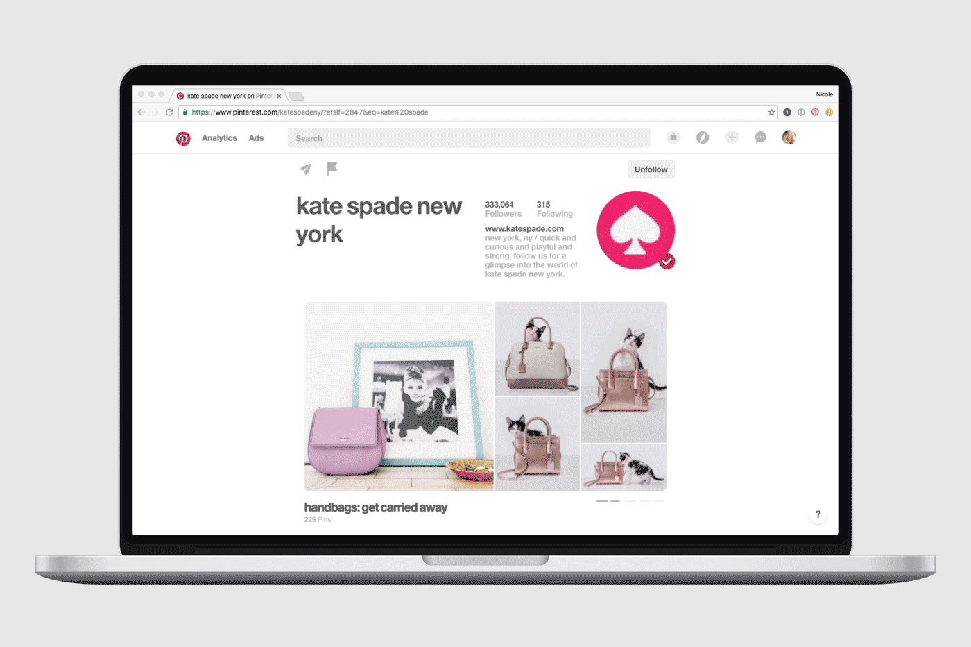 Pinterest profile for Kate Spade on laptop screen