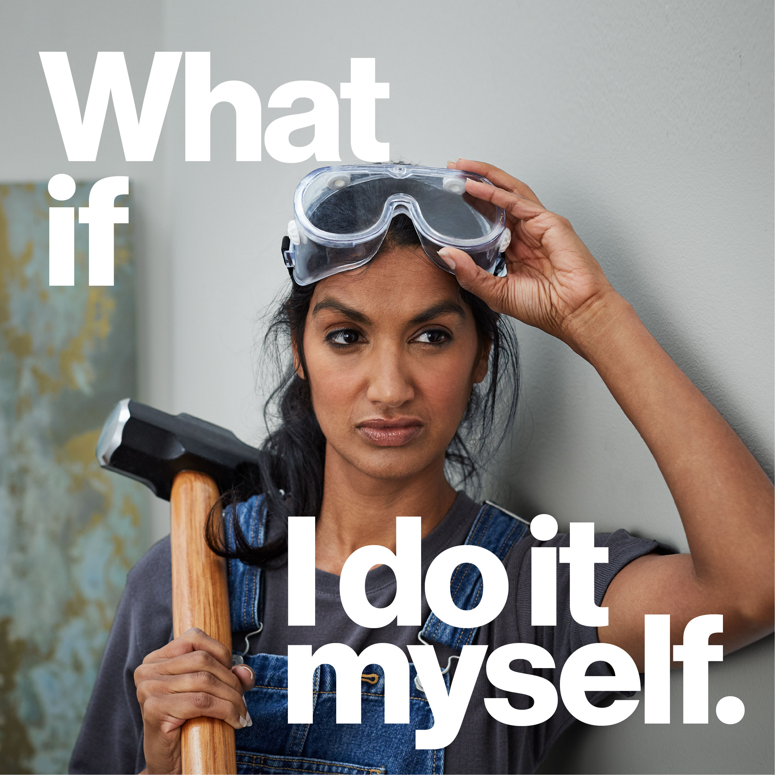 Woman holding a sledgehammer.