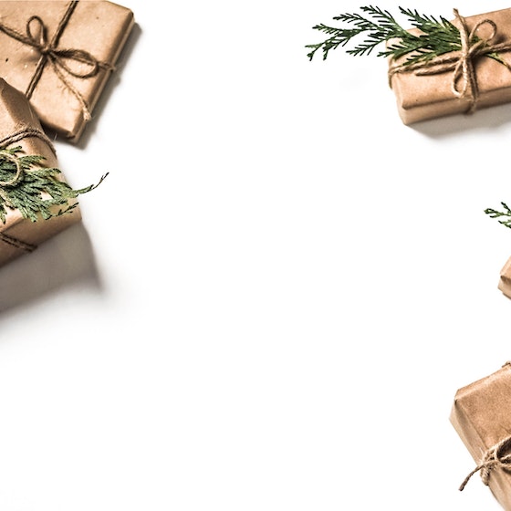 Image of 5 gift boxes wrapped in recycled paper