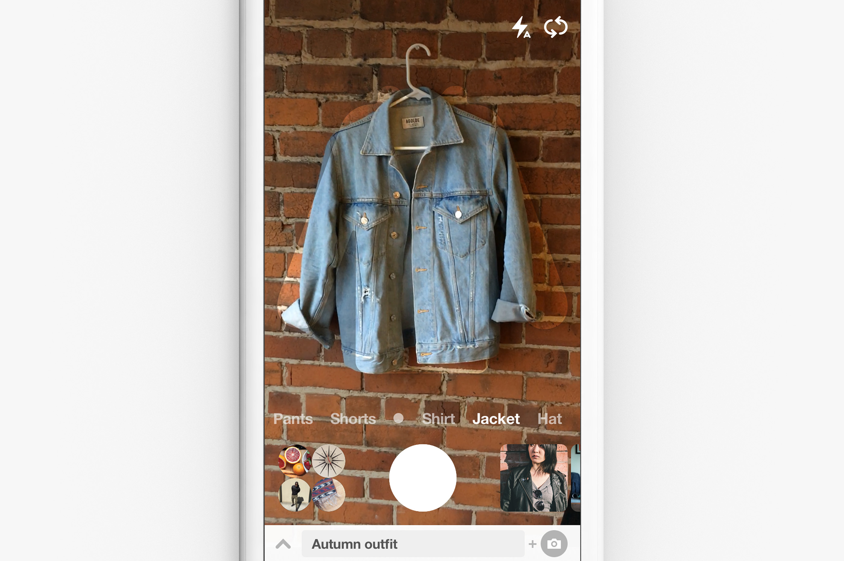 Image of someone taking a picture of a shirt with Pinterest Lens