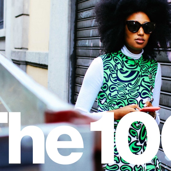Woman with sunglasses and the 100.