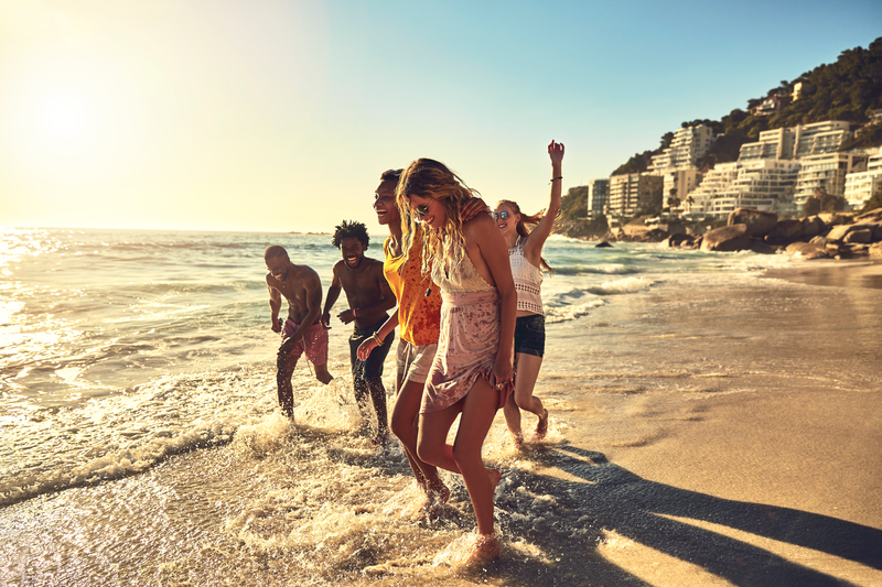 people on beach running